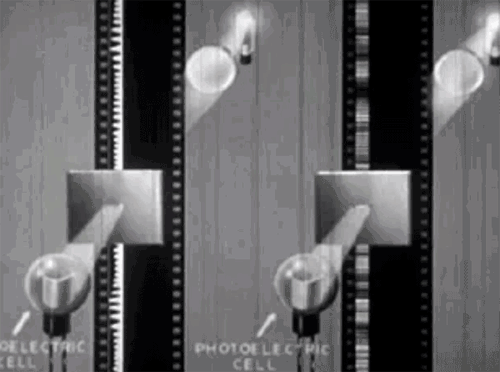 An animated gif showing fluctating light levels as film passes in front of a light source.
